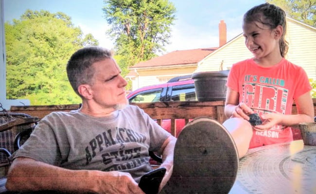 Ron McGovney with his daughter Audrey as seen in July 2019